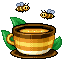 A honey bee teacup with bees overhead
