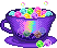 A dark purple teacup full of marbles